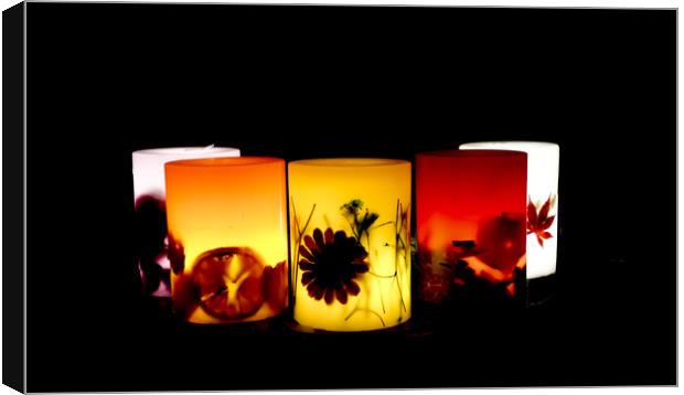 Colourful Christmas Candles Canvas Print by Philip Enticknap