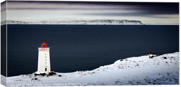 Skardsviti Lighthouse, Iceland Canvas Print by Peter O'Reilly