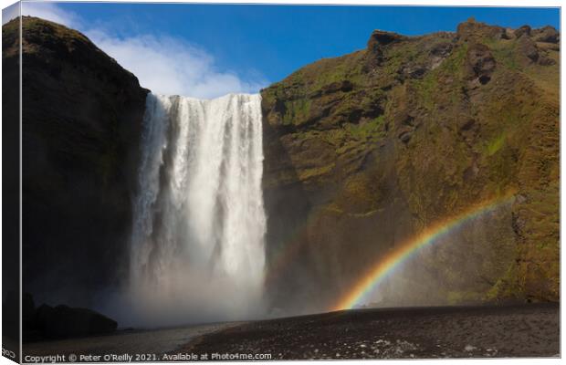 Rainbow at Skogafoss Canvas Print by Peter O'Reilly