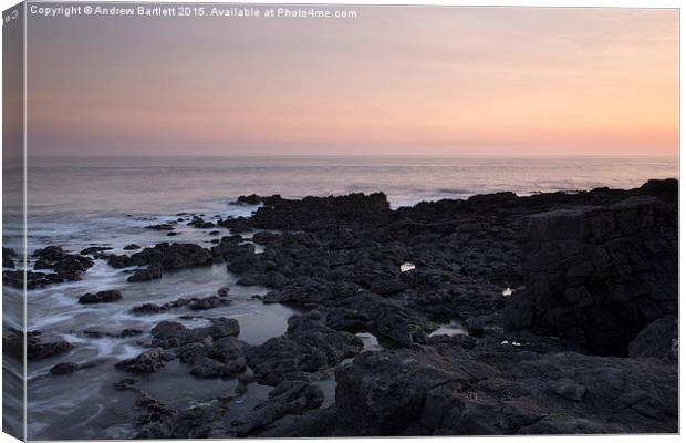 Porthcawl, South Wales, UK, at sunset.  Canvas Print by Andrew Bartlett