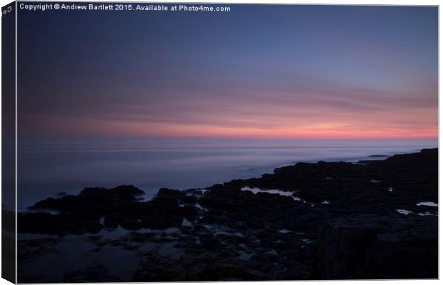 Porthcawl, South Wales, UK, at sunset.  Canvas Print by Andrew Bartlett