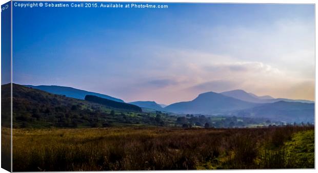 Snowdonia on a misty day Canvas Print by Sebastien Coell