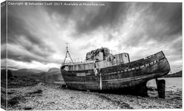 The shipwreck at Fort William beach on the Scottis Canvas Print by Sebastien Coell