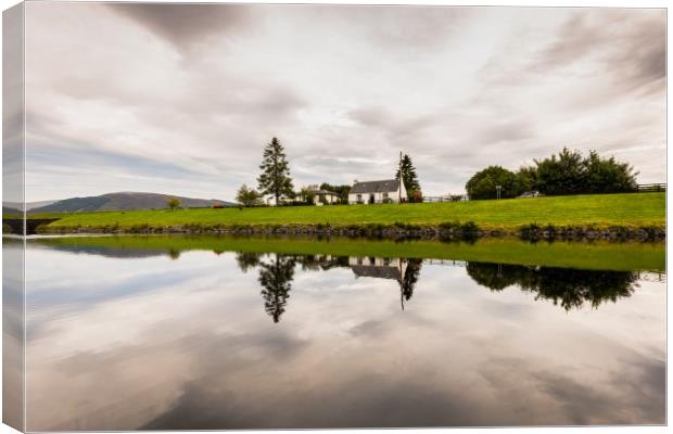 Reflections on the Caledonian Canal at Gairlochy Canvas Print by Nick Rowland