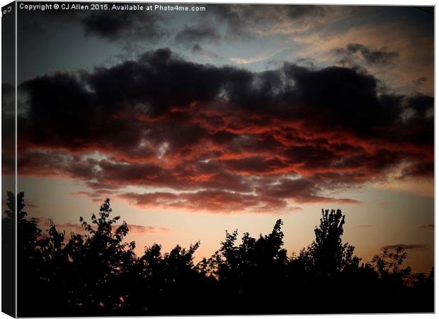  A Shropshire Sunset, reflected on dark clouds Canvas Print by CJ Allen