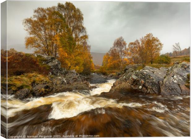 A waterfall in Autumn Canvas Print by Norman Ferguson