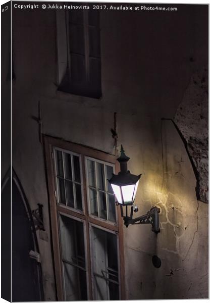 Old Lantern On The Wall Canvas Print by Jukka Heinovirta