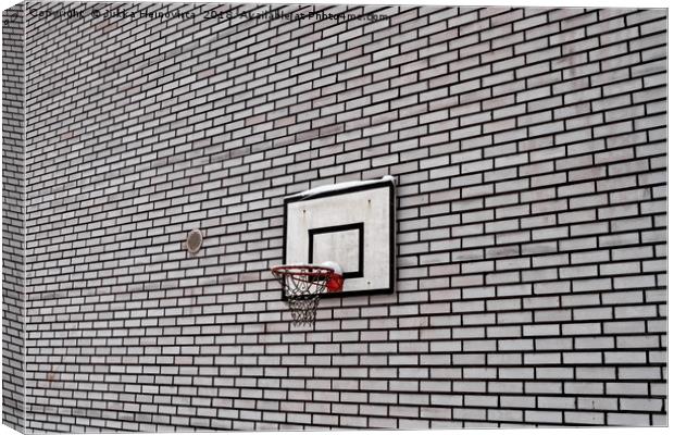 Basketball Hoop On A Brick Wall Canvas Print by Jukka Heinovirta
