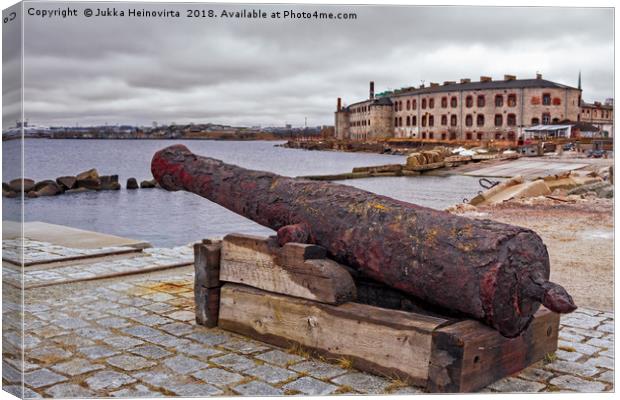 Old Cannon At The Port Canvas Print by Jukka Heinovirta