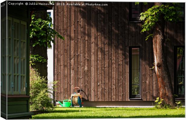 Garden Tools Beside A Modern Building Canvas Print by Jukka Heinovirta