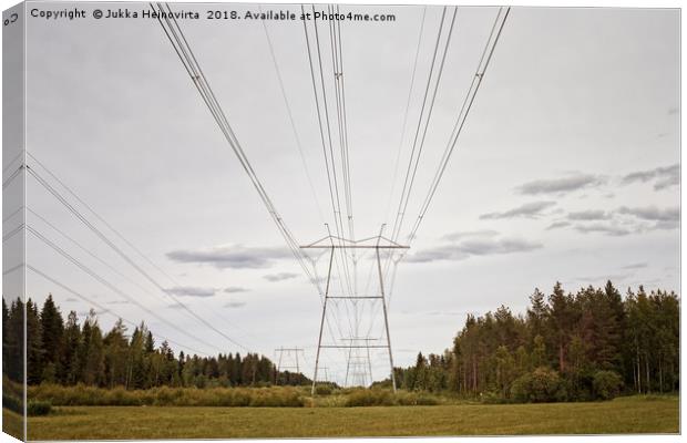 Power Lines Leading To The Horizon Canvas Print by Jukka Heinovirta