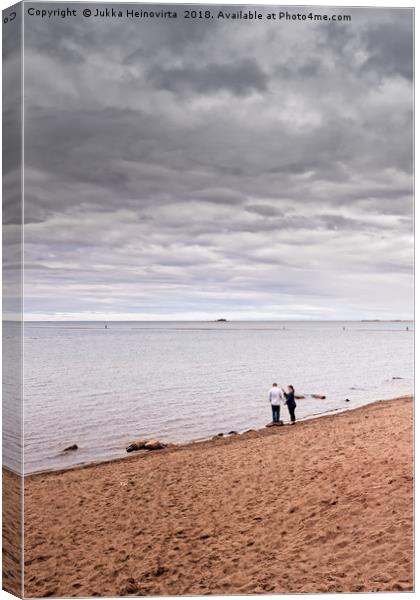 Negotiations At The Beach Canvas Print by Jukka Heinovirta