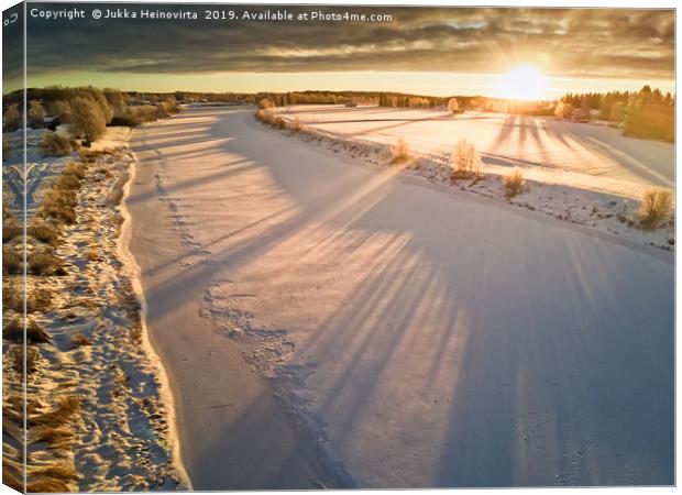 Winter Morning On The River Canvas Print by Jukka Heinovirta