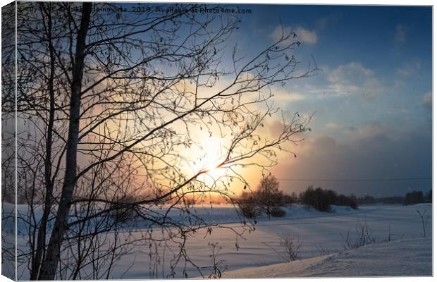 Winter Sunset By The River Canvas Print by Jukka Heinovirta