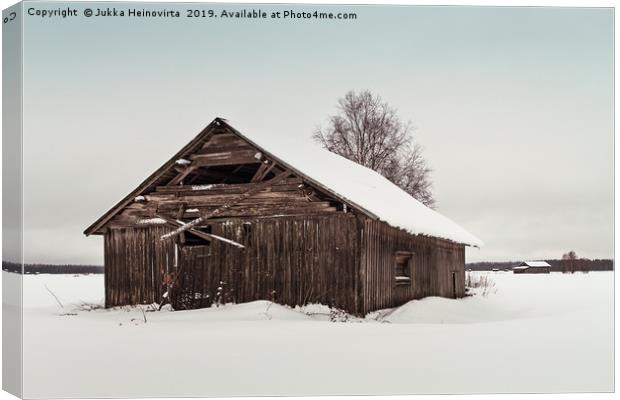 Abandoned Barn House On The Snowy Fields Canvas Print by Jukka Heinovirta
