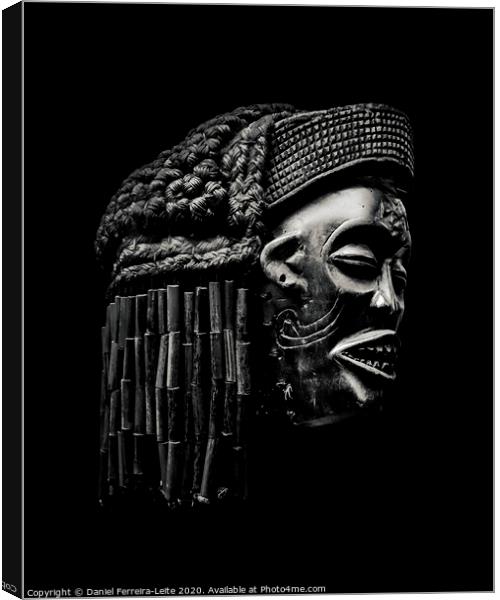 Arfican Head Sculpture on Black Background Canvas Print by Daniel Ferreira-Leite