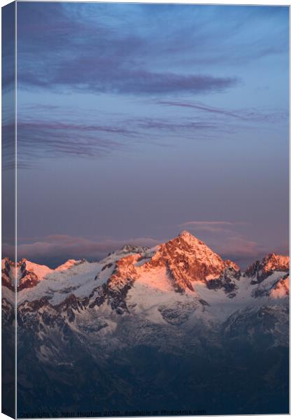 Sunrise in the Alps Canvas Print by John Hughes