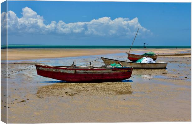 Boats on a Beach Waiting for the Tide Canvas Print by Jeremy Hayden