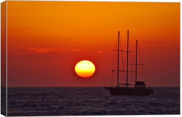 Masts in an Oia Sunset Canvas Print by Jeremy Hayden