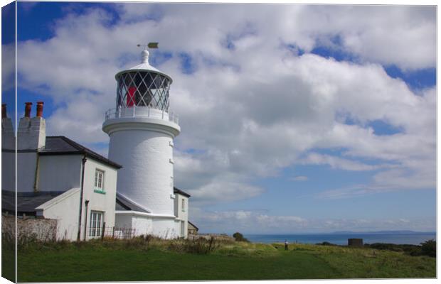 Caldey Island Lighthouse Canvas Print by Jeremy Hayden