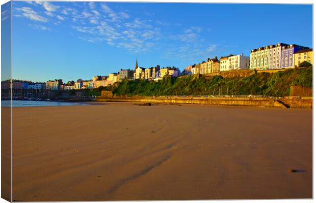 Tenby in the Sunrise from down on North Beach Canvas Print by Jeremy Hayden