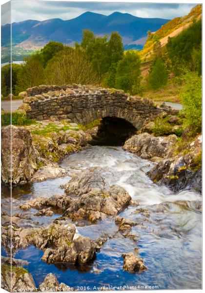 Ashness Bridge on a cloudy day. Canvas Print by Paul Cullen