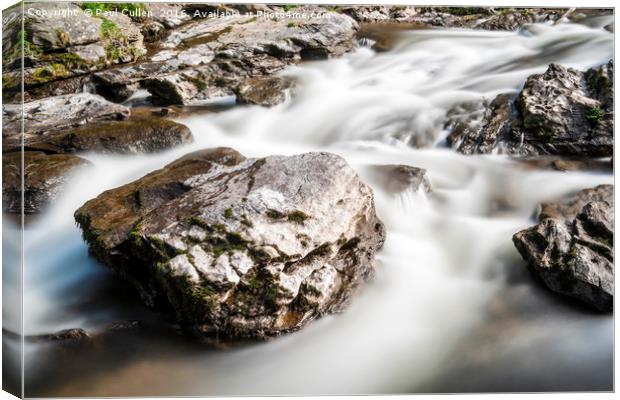 Rocks in the stream - Abstract. Canvas Print by Paul Cullen