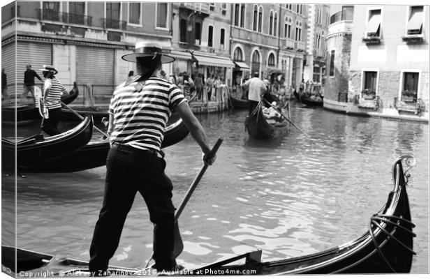 A gondola boatman in Venice Canvas Print by Aleksey Zaharinov