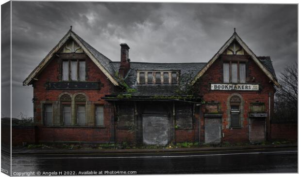 Derelict Bookmakers Canvas Print by Angela H