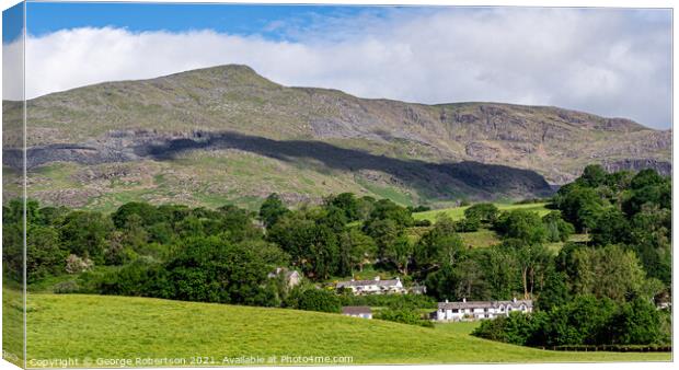 Early morning light on the village of Coniston & the 'Old Man'  Canvas Print by George Robertson