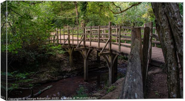 Pooh Sticks Bridge located in the One Hundred Acre woods in the stories Canvas Print by George Robertson
