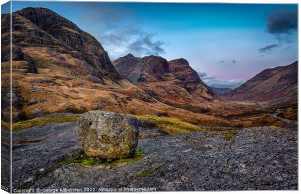 An Erratic rock above Glencoe Valley at sunrise Canvas Print by George Robertson