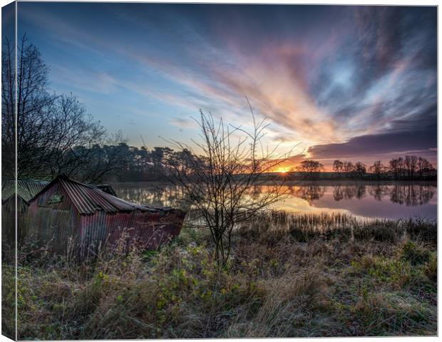 The old boat house at sunrise Canvas Print by George Robertson