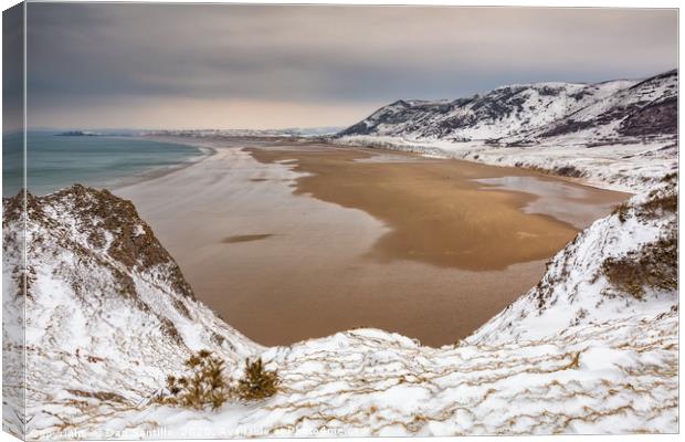 Rhossili Bay in the winter Canvas Print by Dan Santillo