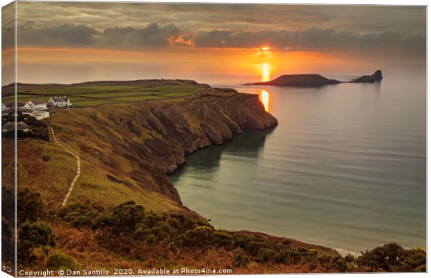 Sunset over Worms Head, Rhossili Bay Canvas Print by Dan Santillo