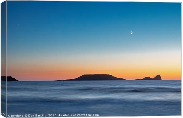 Worms Head, Rhossili Bay with the moon Canvas Print by Dan Santillo
