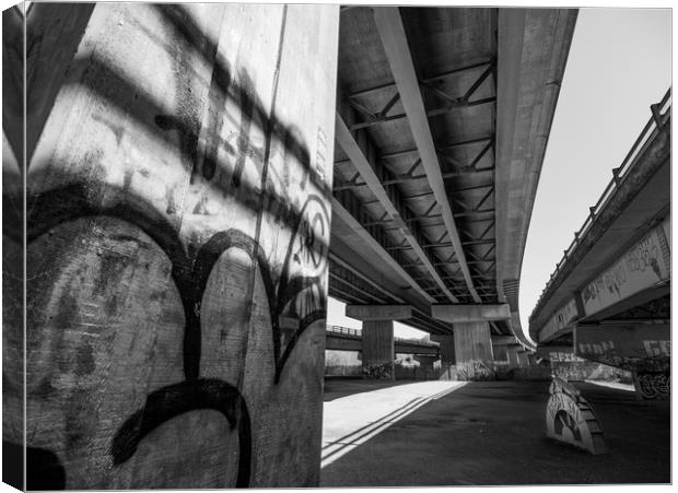Under the Flyover Canvas Print by Jon Rendle