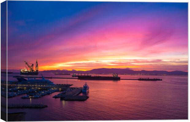 Sunset in the bay of Gibraltar Canvas Print by Piers Thompson