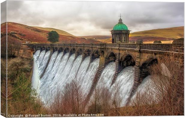 Craig Goch dam in full flow Canvas Print by Russell Burton