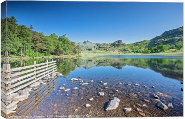 Langdale Pike reflections Canvas Print by Russell Burton