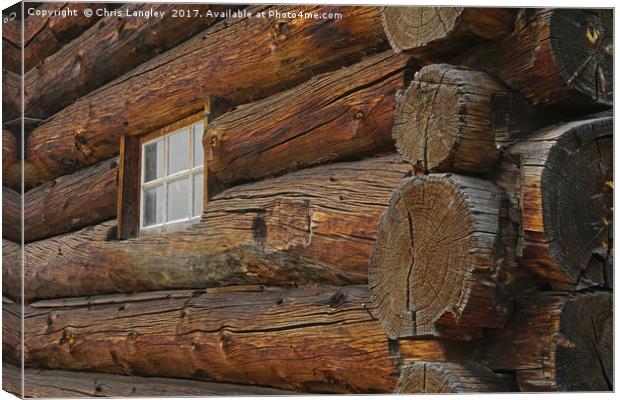 Old hand-cut log barn, 108 Mile Ranch, BC, Canada Canvas Print by Chris Langley