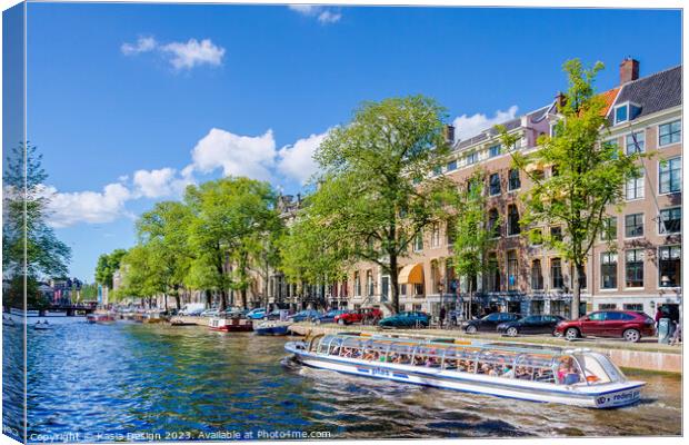 Boatride on a colourful Amsterdam Canal Canvas Print by Kasia Design