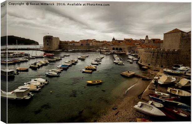 Dubrovnik - The Old Harbour Canvas Print by Susan Witterick