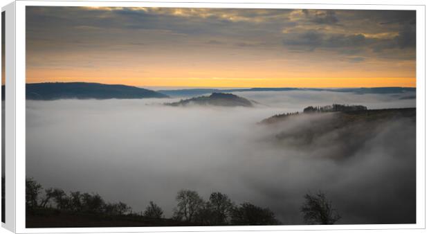 Misty morning in the Horseshoe Pass, Llangollen. Canvas Print by Clive Ashton