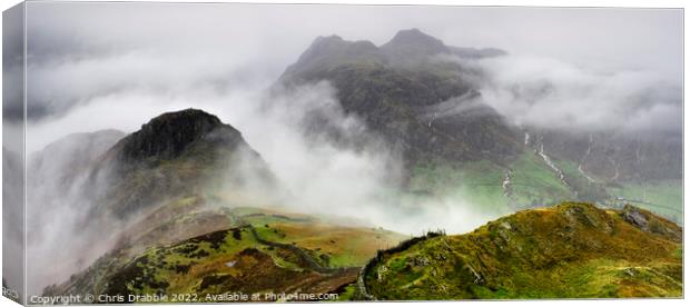 The Langdale pikes in the grip of a storm Canvas Print by Chris Drabble