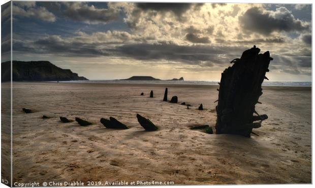 The wreck of the Helvetia at sunset, Rossili Bay Canvas Print by Chris Drabble