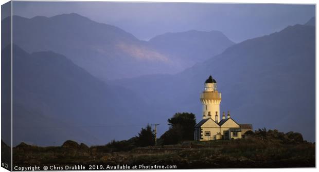 Winter light on Isle Ornsay Lighthouse  Canvas Print by Chris Drabble