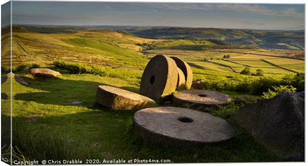 Abandoned mill stones at Stanage Edge              Canvas Print by Chris Drabble