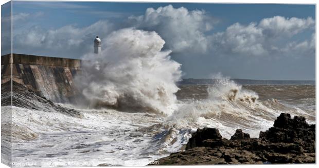 Porthcawl lighthouse in a storm Canvas Print by Chris Drabble