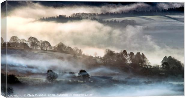 Morning mist in the Derwent Valley. Canvas Print by Chris Drabble